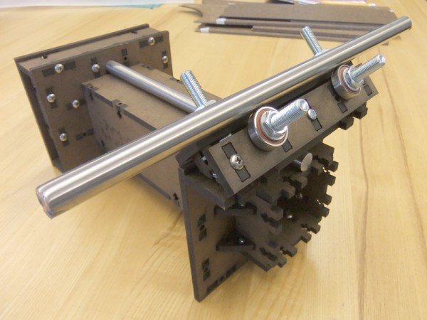 Low-cost trapped linear bearing. Low-cost trapped linear bearing.